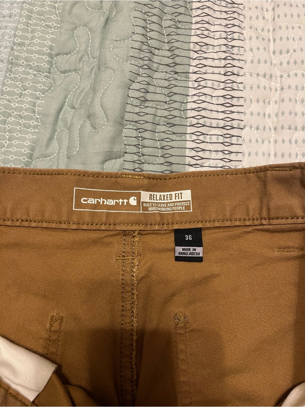 Two Carhartt Relaxed Fit 9i inch shorts.